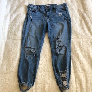 Distressed blue jeans